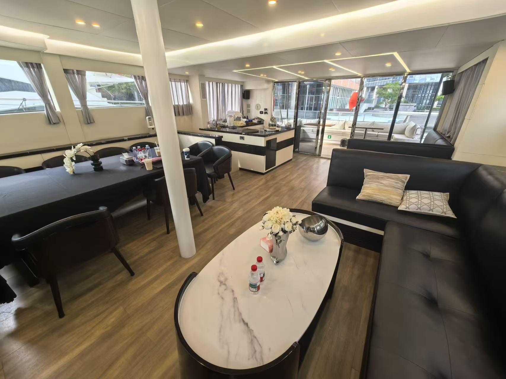 Salon lounge and galley bar of Mazarin 55 sailing catamaran