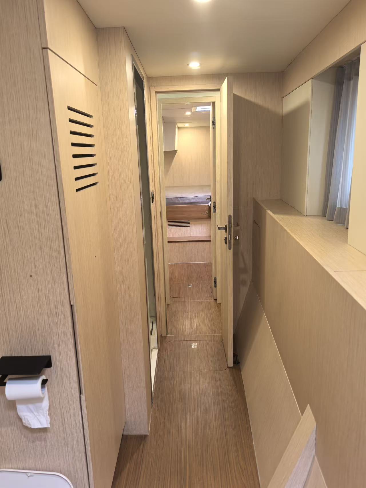 Corridor to guest cabins of Mazarin 55 sailing catamaran