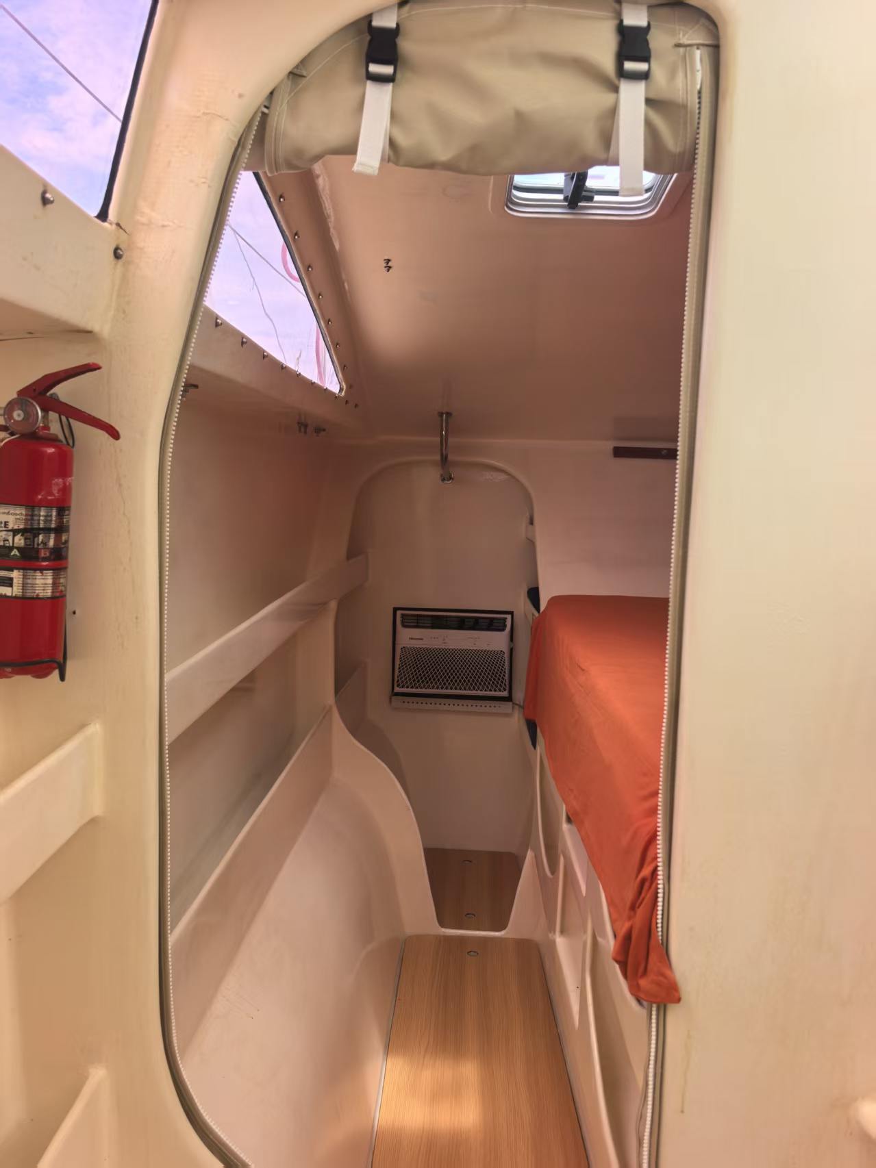 Andaman Dream orange cabin entrance and air conditioning