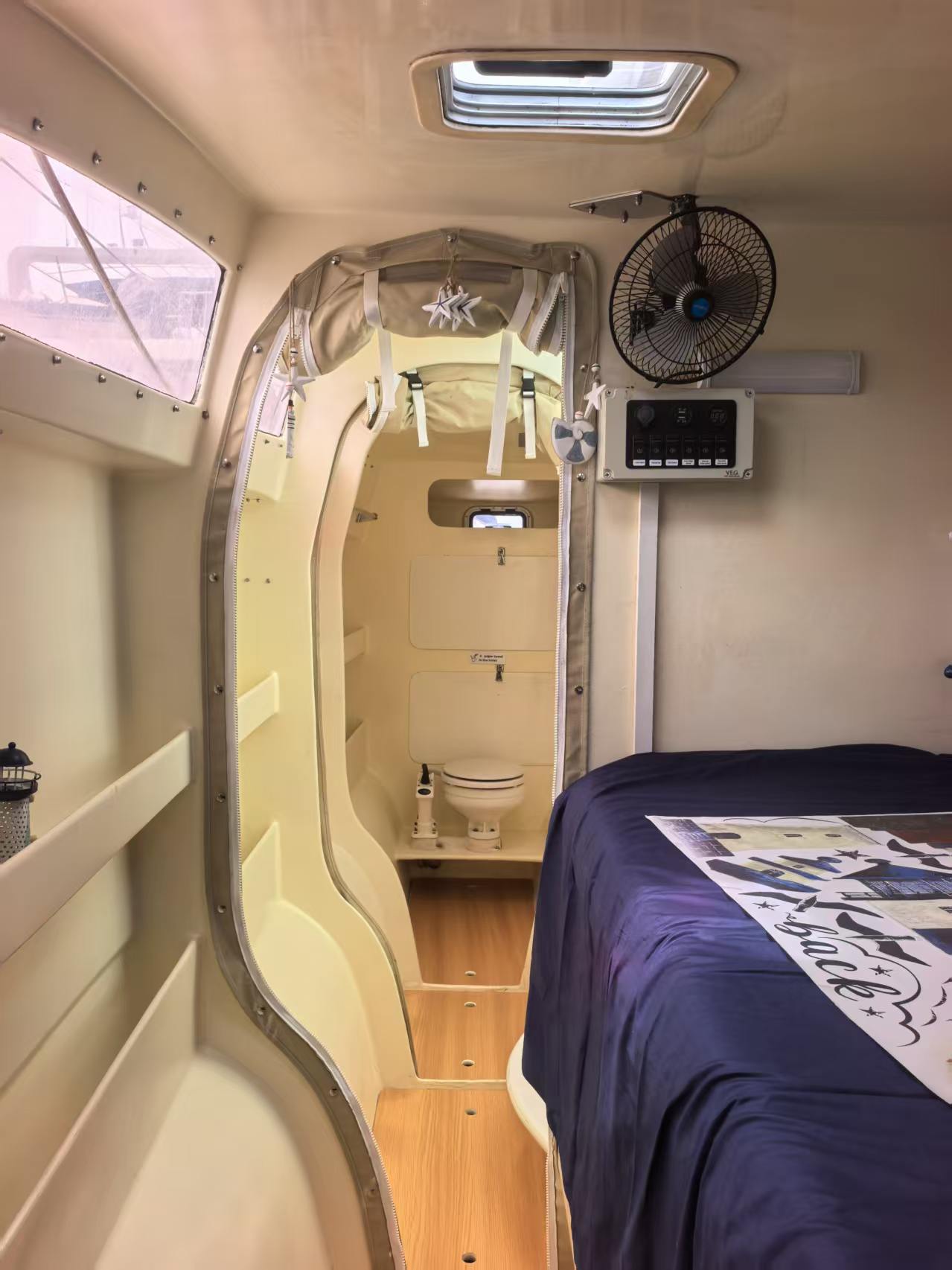 Andaman Dream blue cabin and passage to the bathroom