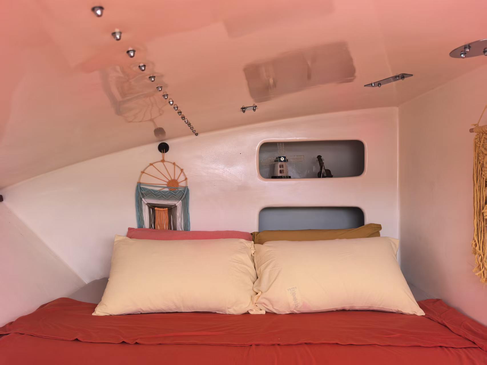 Andaman Dream orange cabin pillows and storage shelves