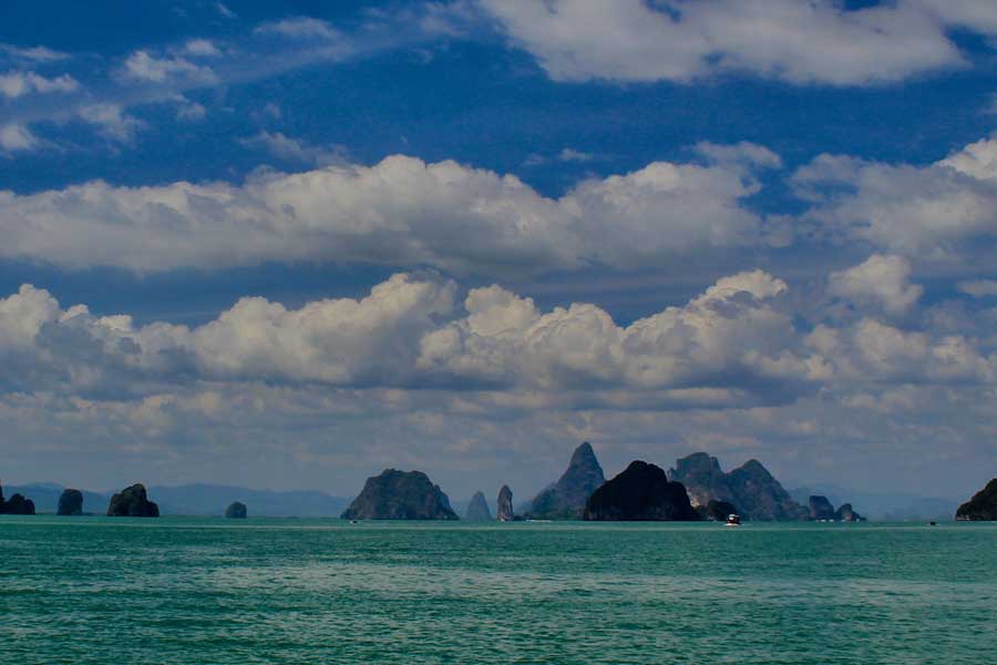 Kayaking between limestone cliffs in Phang Nga Bay