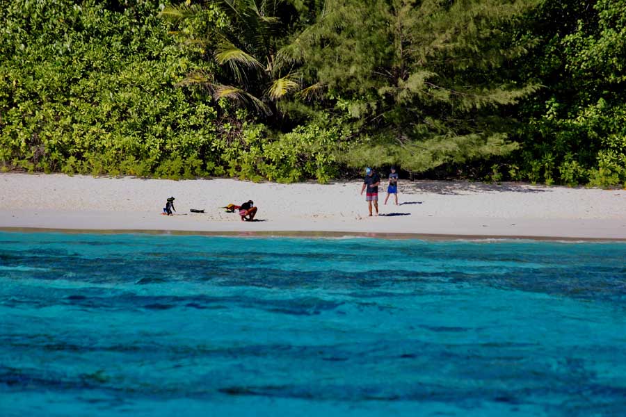 Yacht anchored off a remote beach in the Surin Islands