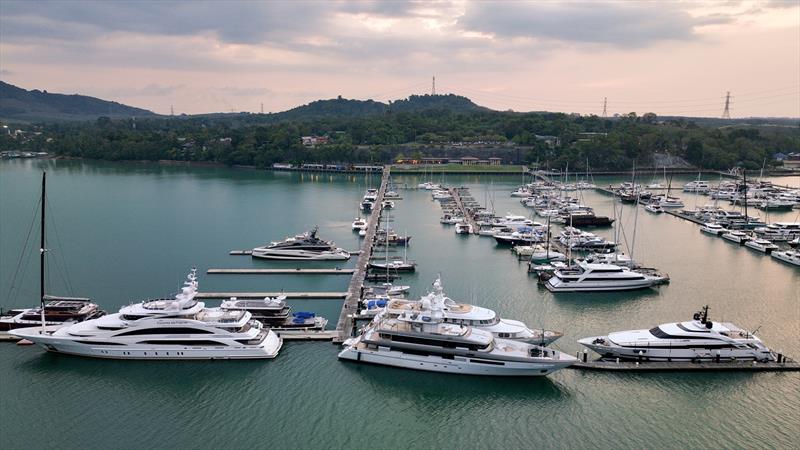Yachts moored at Yacht Haven Marina during sunset